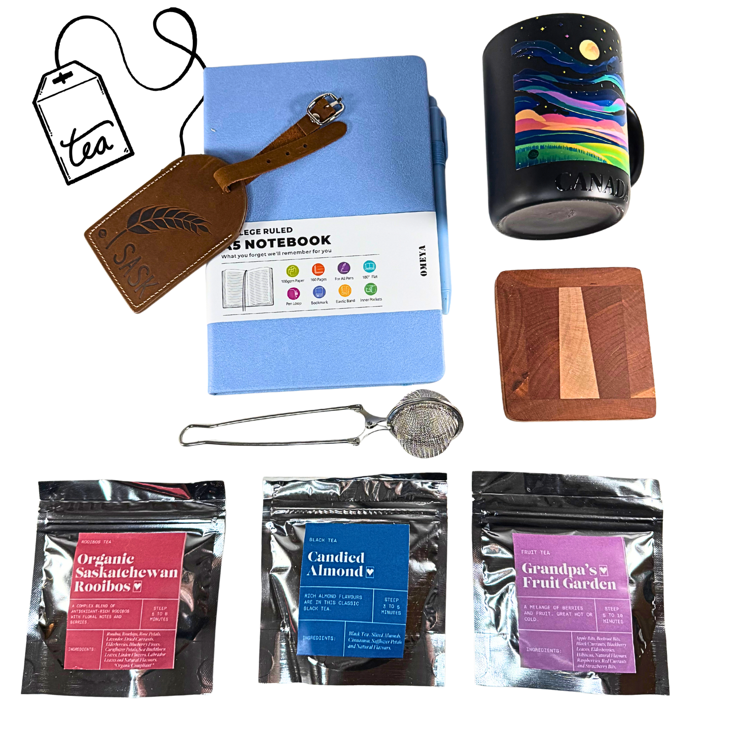 Prairie Tea Gift Box featuring handmade mug, wooden coaster, teas, notebook, and infuser in a white gift box with tissue and ribbon.