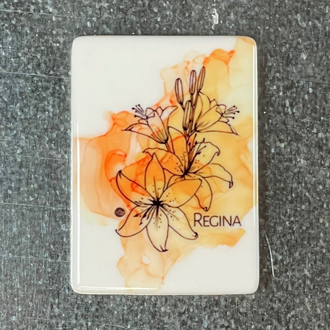 Bring a piece of the Prairies into your home with our vibrant, nostalgia-filled fridge magnets! Whether you're gifting someone special or adding a touch of local charm to your own space, these magnets are a perfect keepsake that celebrates Saskatchewan, Alberta, and Manitoba.
With bold colors, classic Prairie imagery, and handcrafted details, these magnets make a thoughtful gift for friends and family near or far. Add them to a custom gift box or collect them as a reminder of the wide-open skies, golden fi