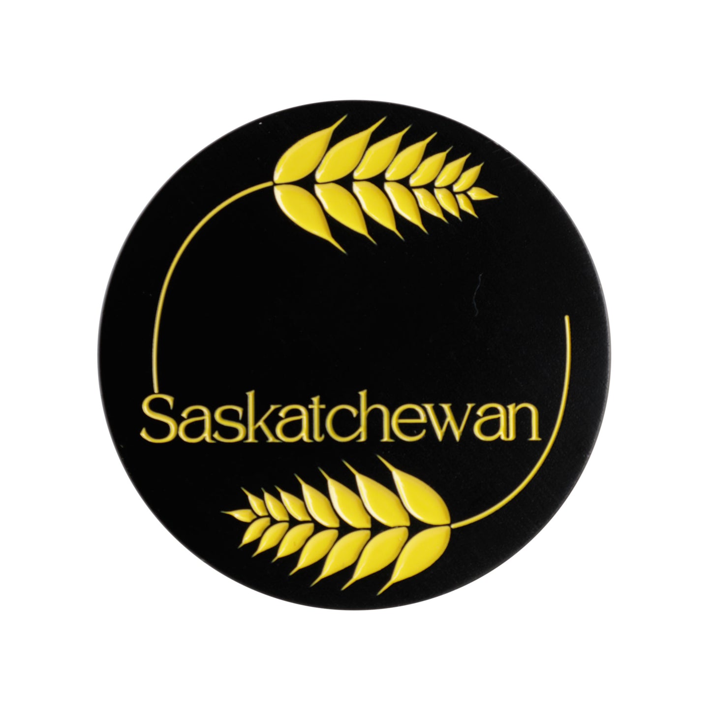 Black circular magnet with logo with yellow wheat stalks and 'Saskatchewan' text on a white background