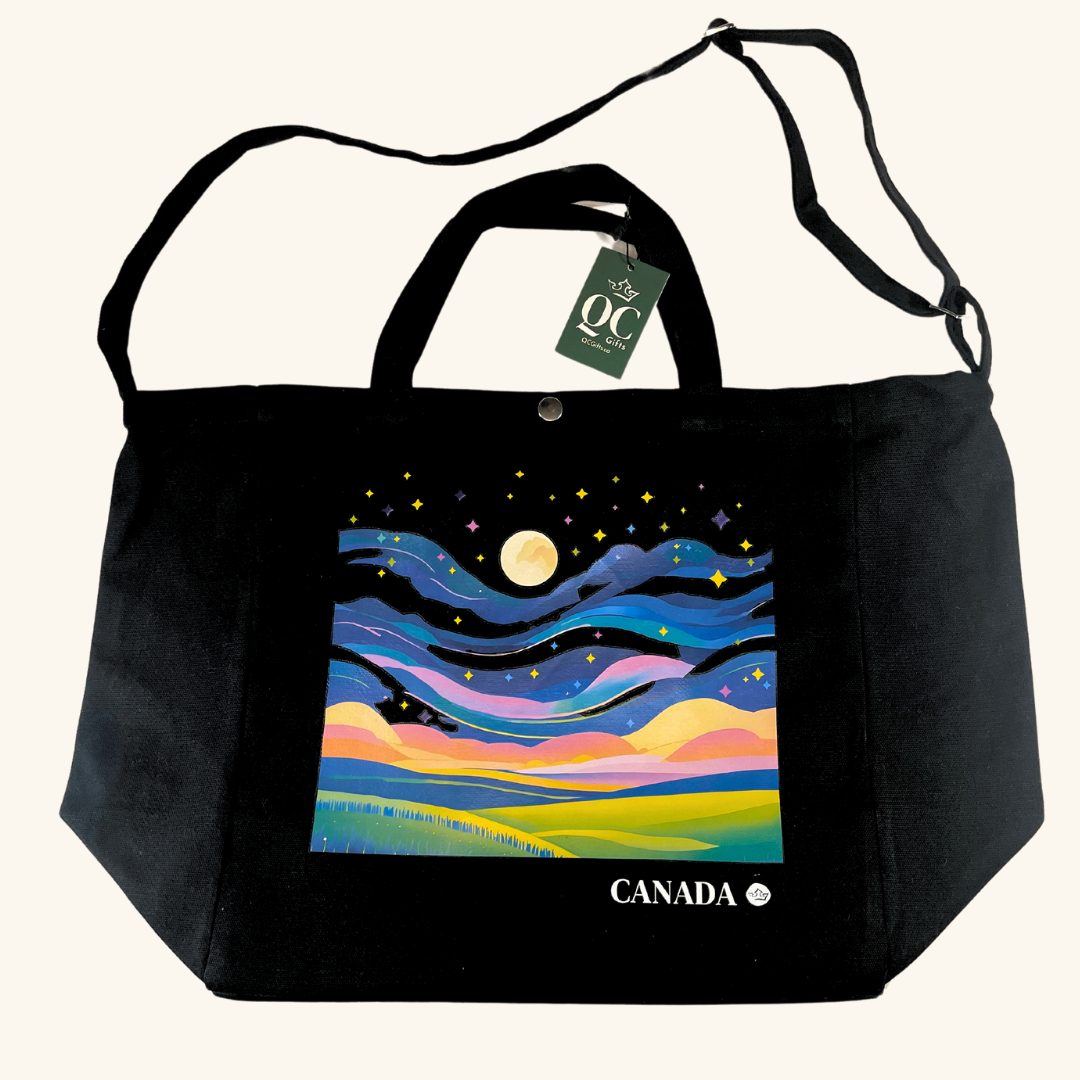 Inspired by the magic of Canada’s northern lights, the Aurora Borealis Canvas Bag in sleek black is the perfect blend of elegance and functionality. Whether you’re running errands, heading to work, or planning a weekend getaway, this bag has you covered.

Features:

Dual Carrying Options: Designed with short handles and an adjustable strap for versatile carrying comfort.
