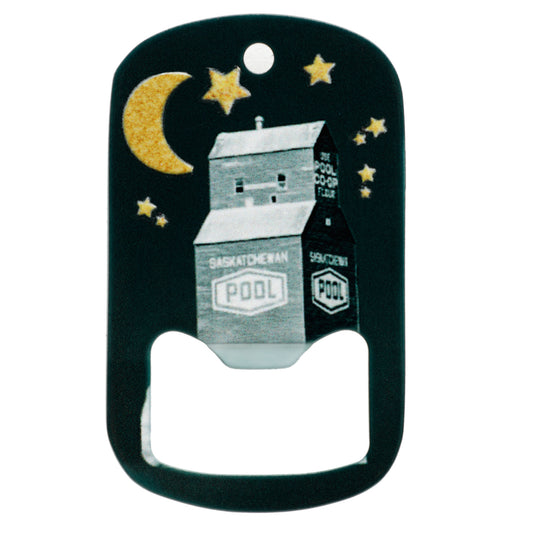Bottle opener with Saskatchewan Pool branding and decorative design on a white background