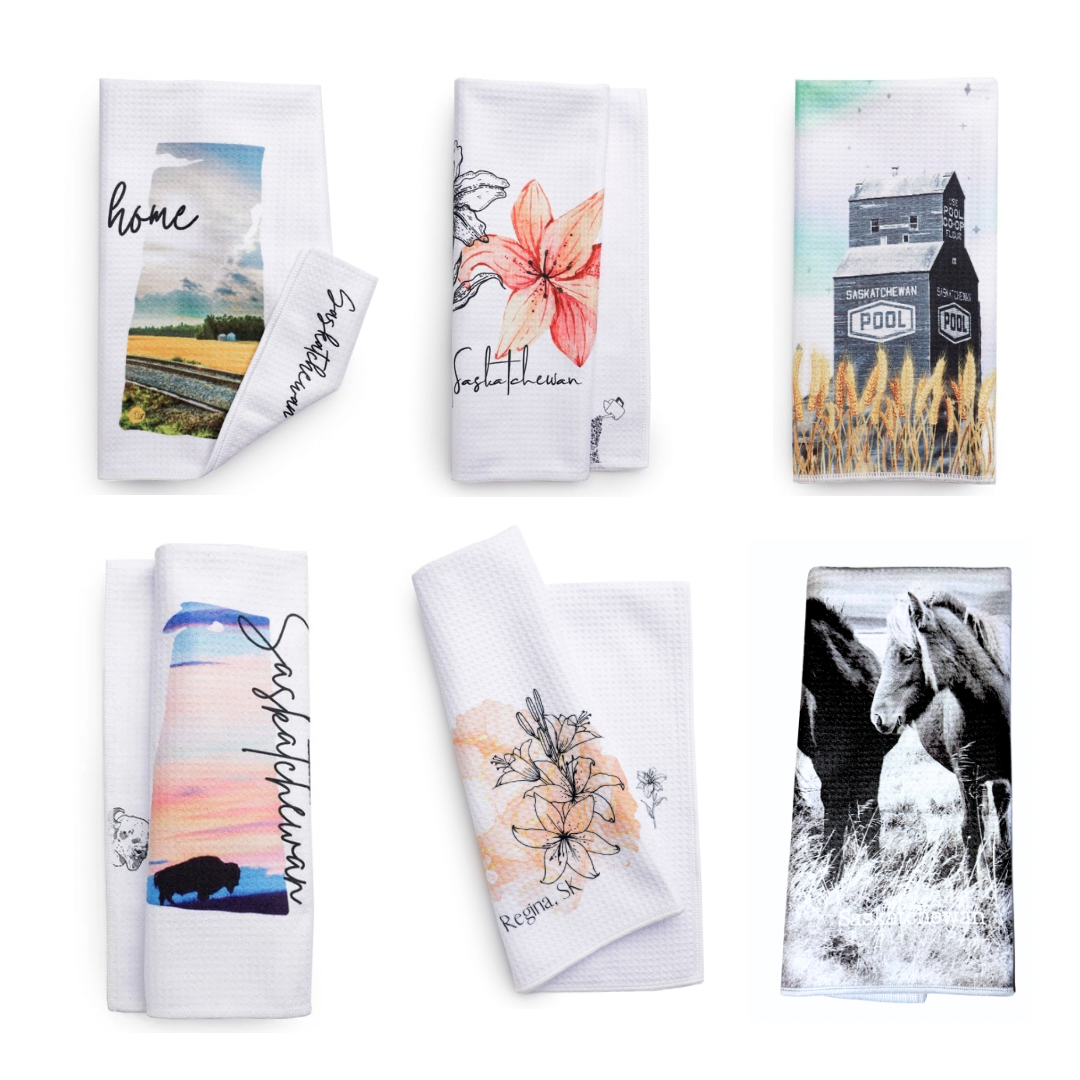 Set of decorative towels with various prints on a white background