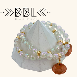 Showing the lucy charm necklace up close for a perfect prairie charm