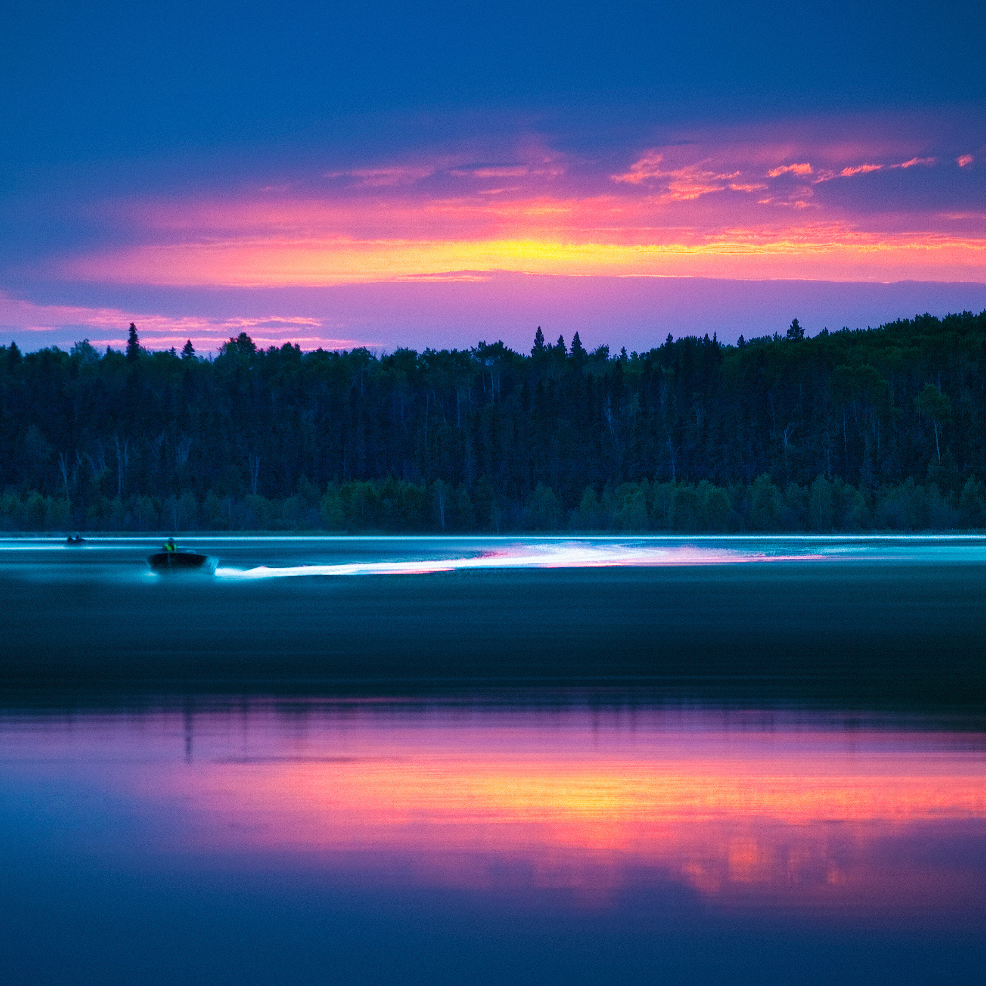 A serene Saskatchewan lake a dusk