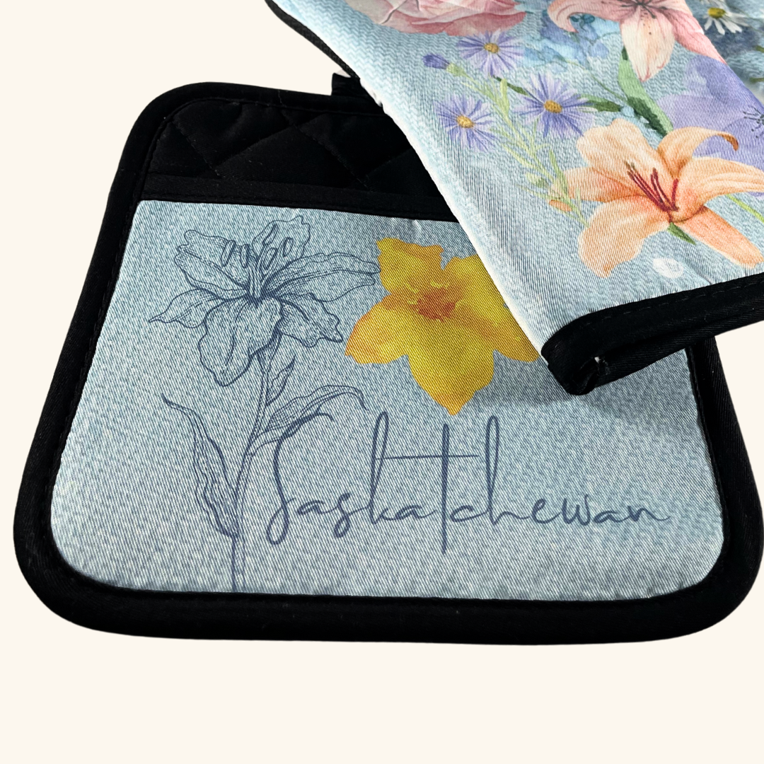 Prairie Oven Mitts – Celebrate Prairie Heritage in Your Kitchen

Bring a touch of prairie beauty into your home with our Prairie Oven Mitts, featuring two stunning designs that capture the essence of prairie life. Perfect for adding a dash of prairie charm to your kitchen, these mitts are both functional and visually striking.