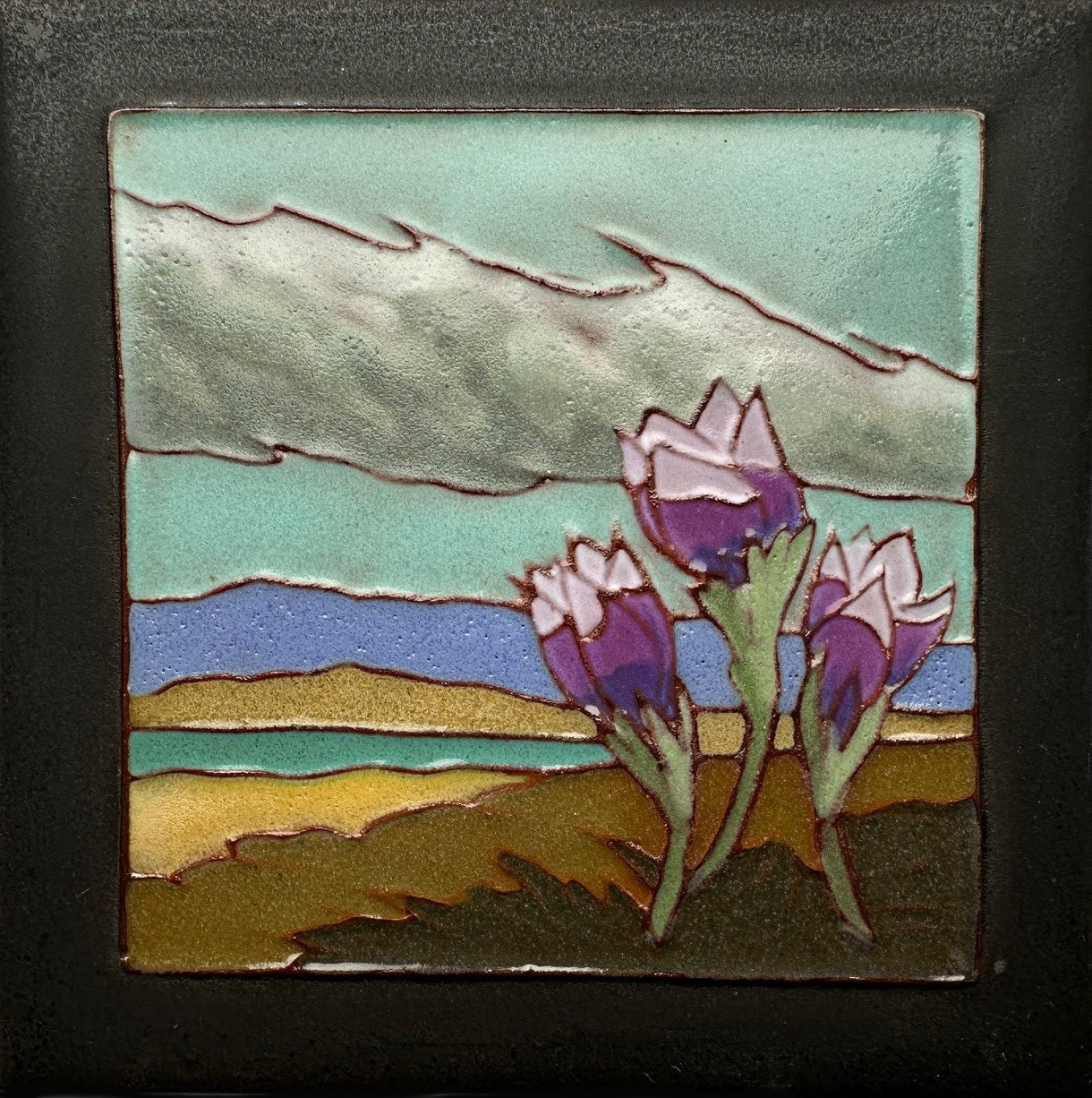Decorative tile with stylized crocus manitoba flowers and landscape