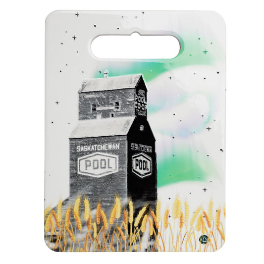 Hot Plate or Trivet with a grain elevator and wheat design on a white background