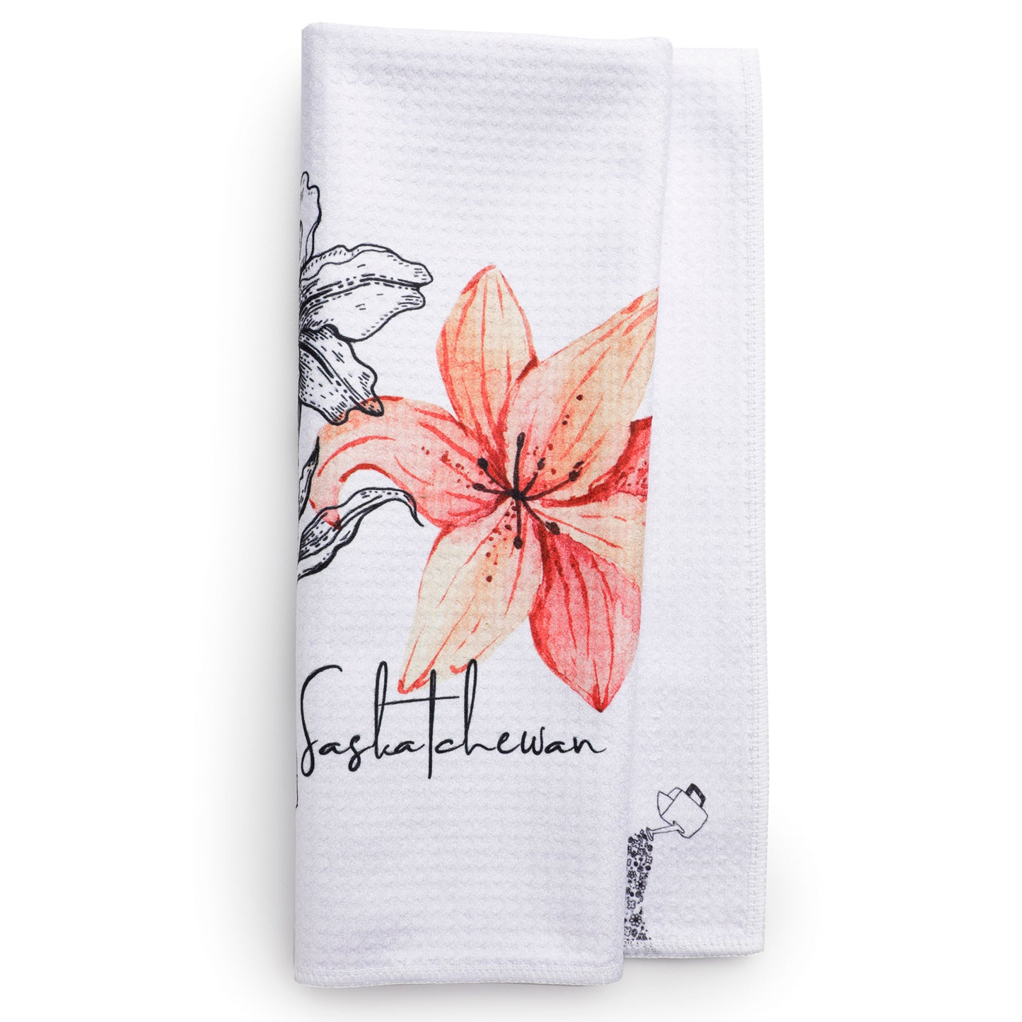 White towel with floral design and 'SaskactchewanSaskatchewan branding on a white background