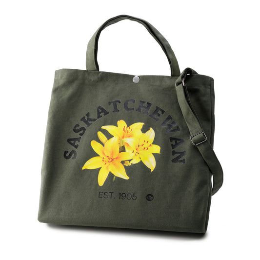 Green tote bag with yellow flowers and 'Saskatchewan' text on a white background