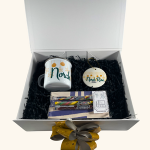 Celebrate the magic of the holiday season with our Retro Holiday Gift Box, a nostalgic treat with a modern twist! This beautifully packaged gift includes:

a customized stainless steel tin mug,
&nbsp;a handmade ceramic ornament,
&nbsp;and old-fashioned candy sticks reminiscent of simpler times.

Packaged in a stunning magnetic box with festive flair, this gift is perfect for the little ones in your life or anyone who loves a retro vibe. Available for fast delivery within 24 hours, this $29.95 gift box is re