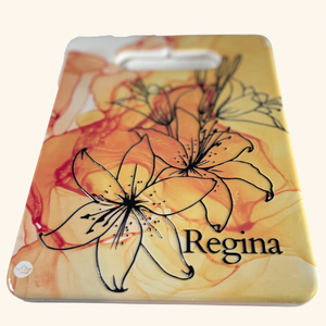 Beautifully textured ceramic trivet with a Regina Prairie Lily design, celebrating Saskatchewan’s provincial flower.