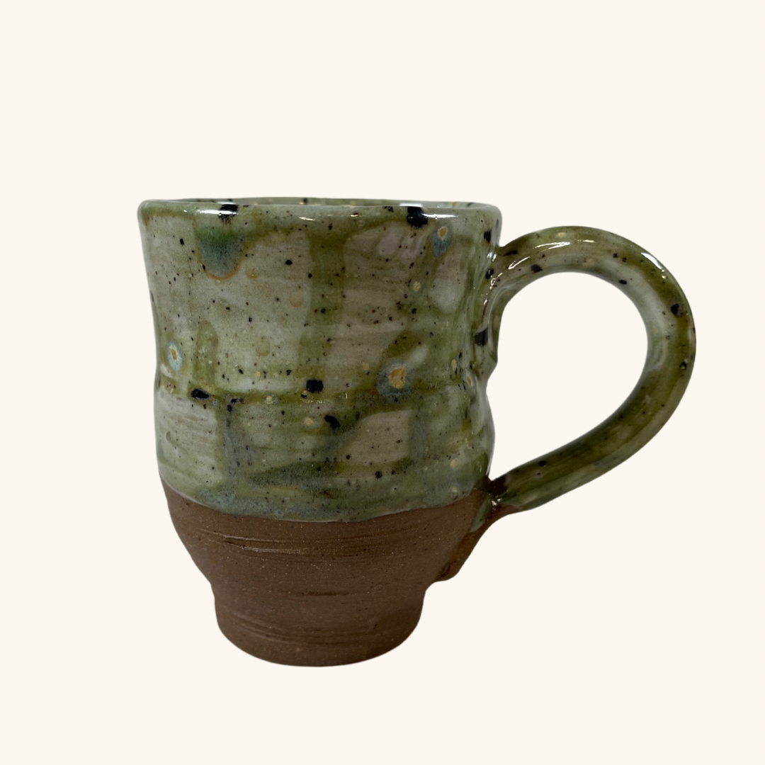 Handmade ceramic mug by Charlotte Hauk, featuring a unique glaze and artistic craftsmanship. Northern Lights 