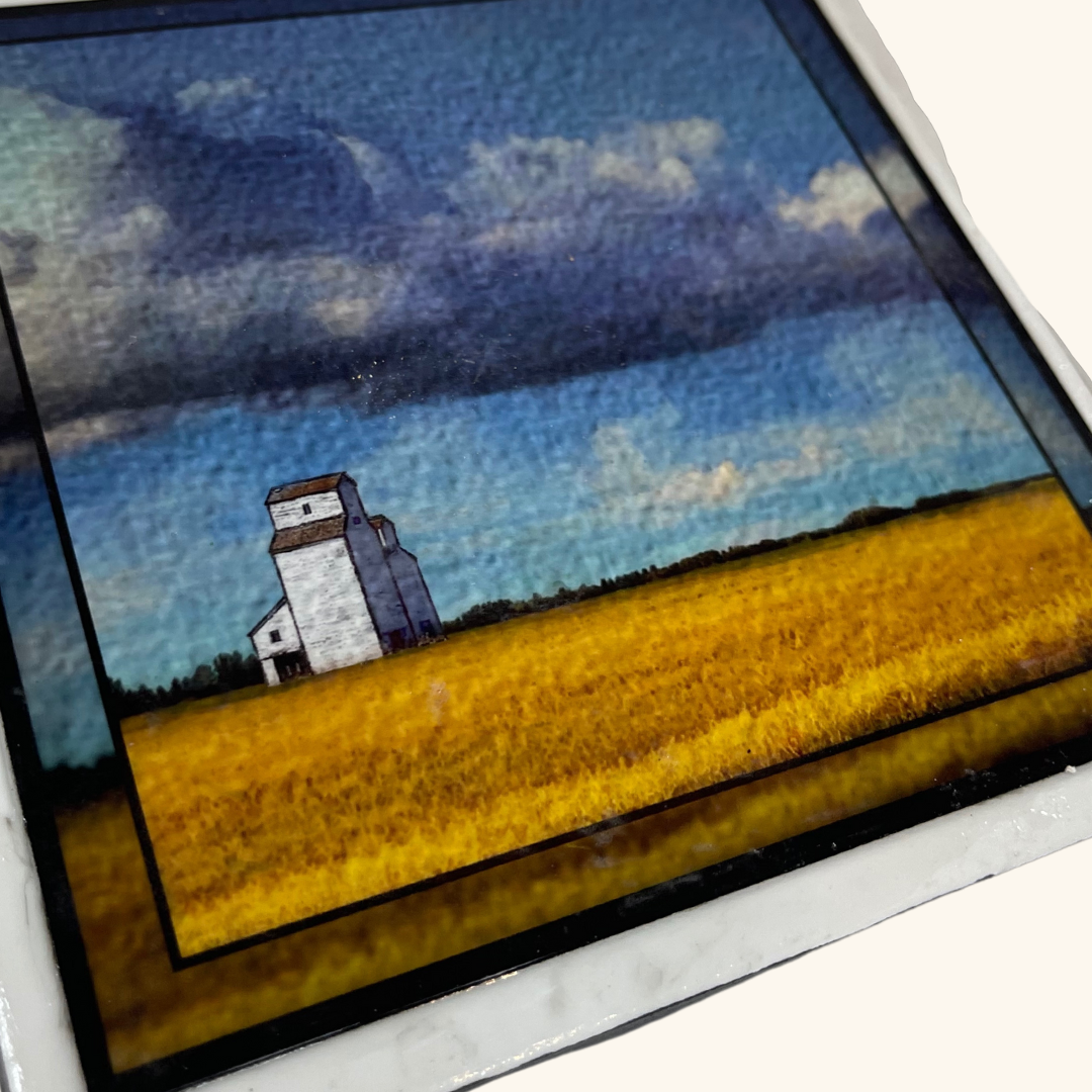 Handcrafted 6x6 tile depicting a vast Prairie field with a rustic Saskatchewan grain elevator in the distance