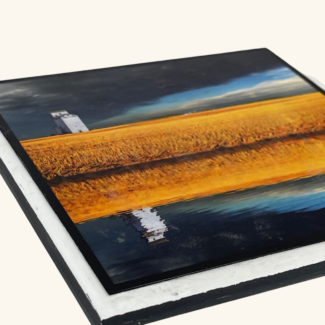 x6 tile artwork capturing the reflection of a field and grain elevator, highlighting the serene beauty of Saskatchewan’s rural landscape.