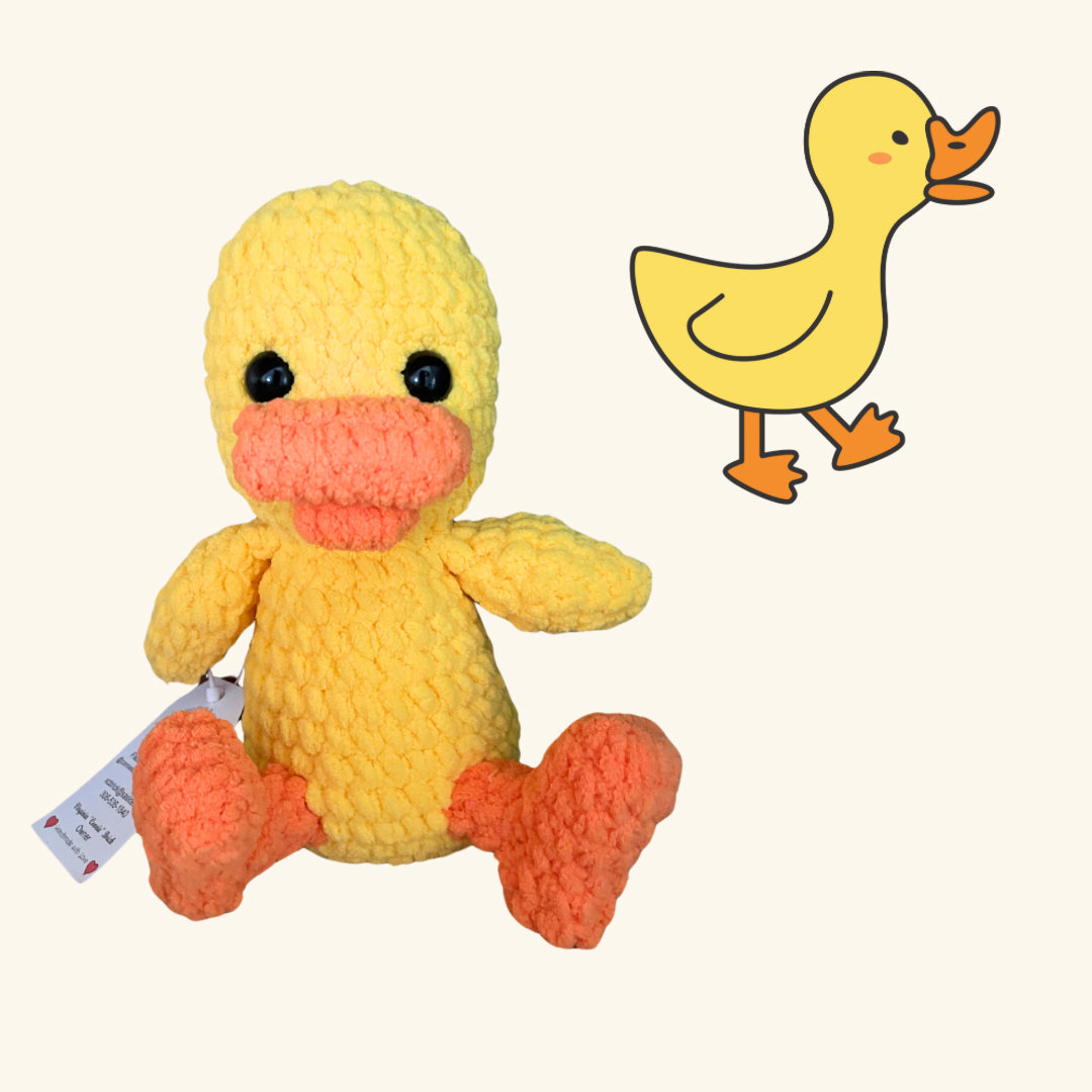 Handcrafted crochet duck from Connie's Crochet & Craft Corner, made with bright yellow yarn and soft stuffing.