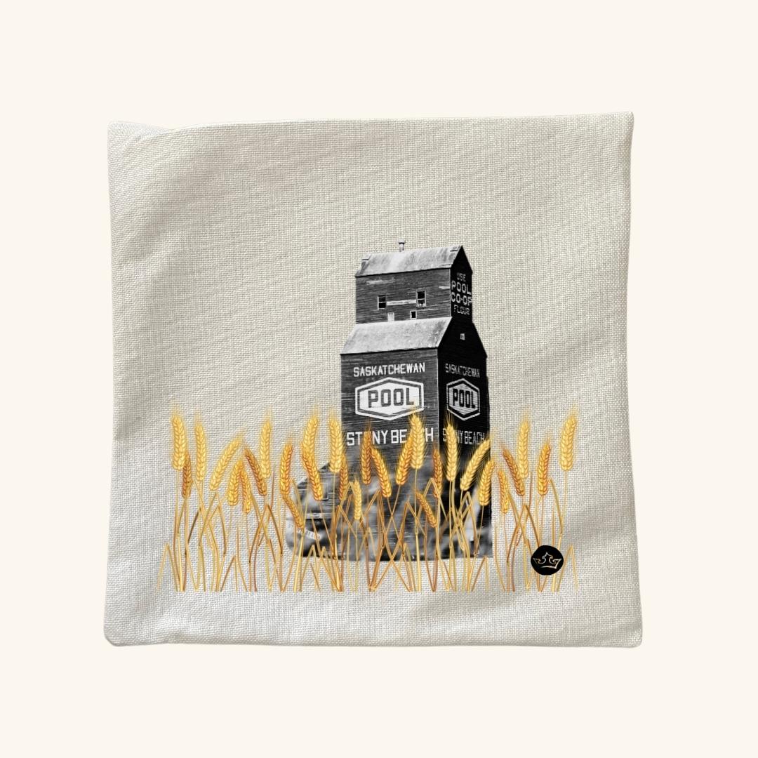 Decor pillow featuring a beautifully illustrated Saskatchewan grain elevator, celebrating Prairie heritage and rustic charm