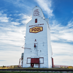 Scenic photograph of a grain elevator in saskatchewan, celebration the Wheat Pool.