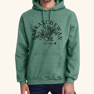 Prairie Flower Hoodie in green, a cozy and stylish way to wear Saskatchewan’s prairie lily emblem with pride.