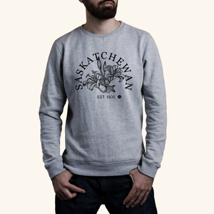 Prairie Flower Sweatshirt in grey, showcasing a minimalist black prairie lily design for a timeless Saskatchewan look.