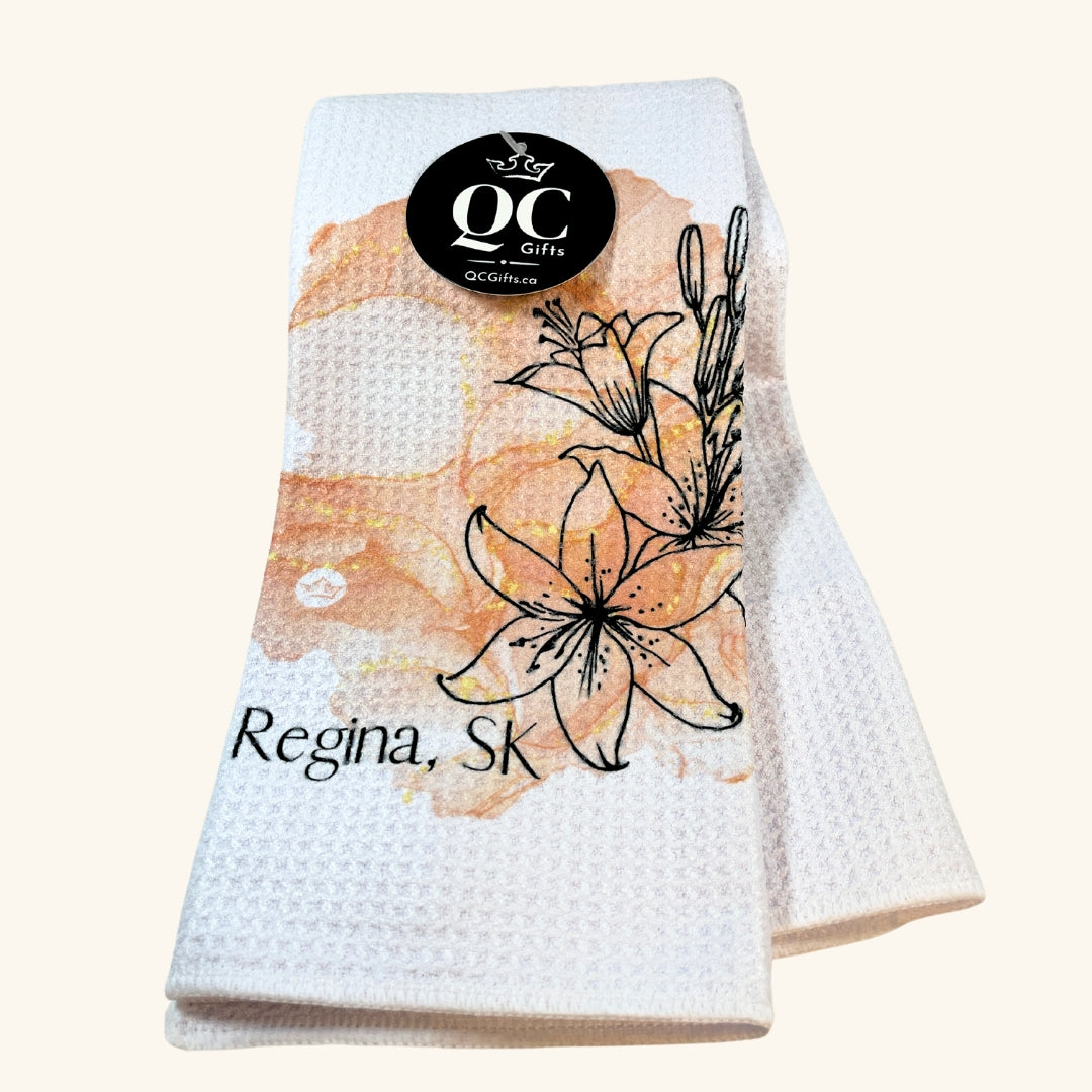 Regina Ink Drop Tea Towel with a unique watercolor-style cityscape design, highlighting the capital of Saskatchewan.