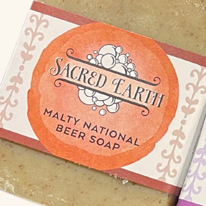 A handcrafted bar of Sacred Earth Soap, infused with natural essential oils for a refreshing and nourishing cleans