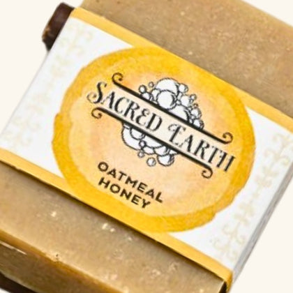 A handcrafted bar of Sacred Earth Soap, infused with natural essential oils for a refreshing and nourishing cleans