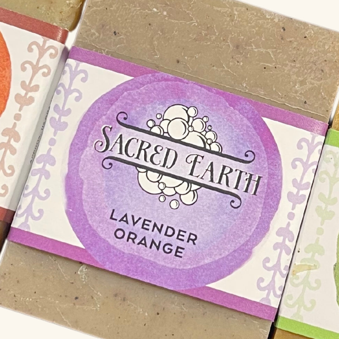 A handcrafted bar of Sacred Earth Soap, infused with natural essential oils for a refreshing and nourishing cleanse