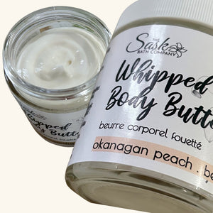 The Sask Bath Co. Okanagan Peach Bellini Body Butter Lotion, infused with a sweet, fruity scent and natural hydration.