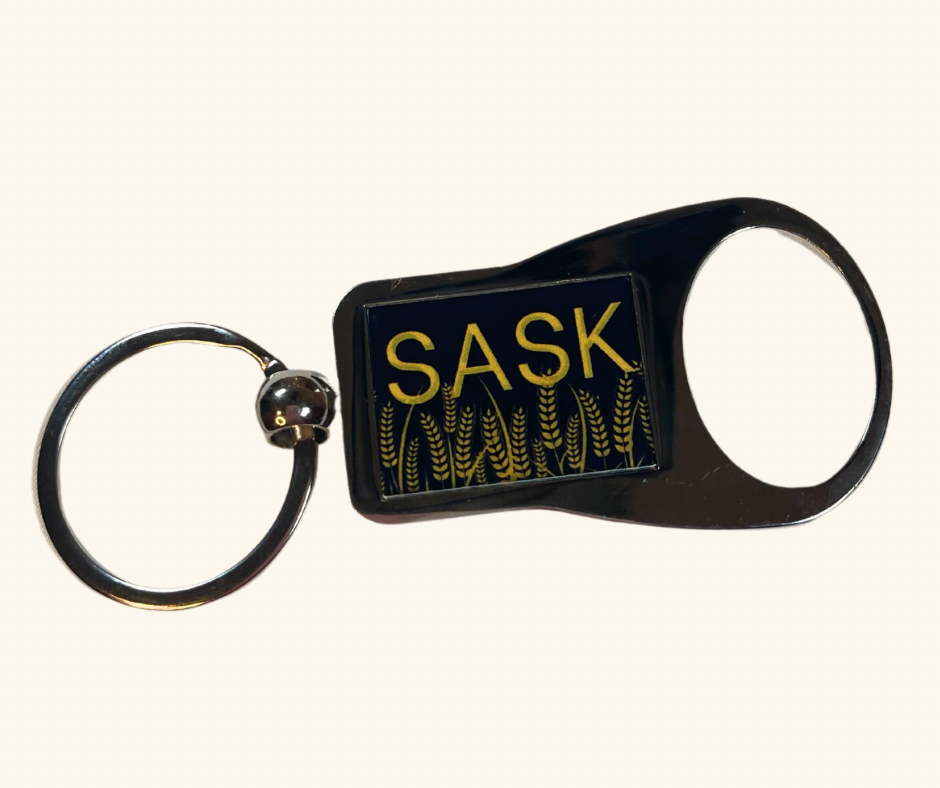 Collection of handcrafted Saskatchewan keychains featuring Prairie-inspired designs, made in-house at QCGifts.ca