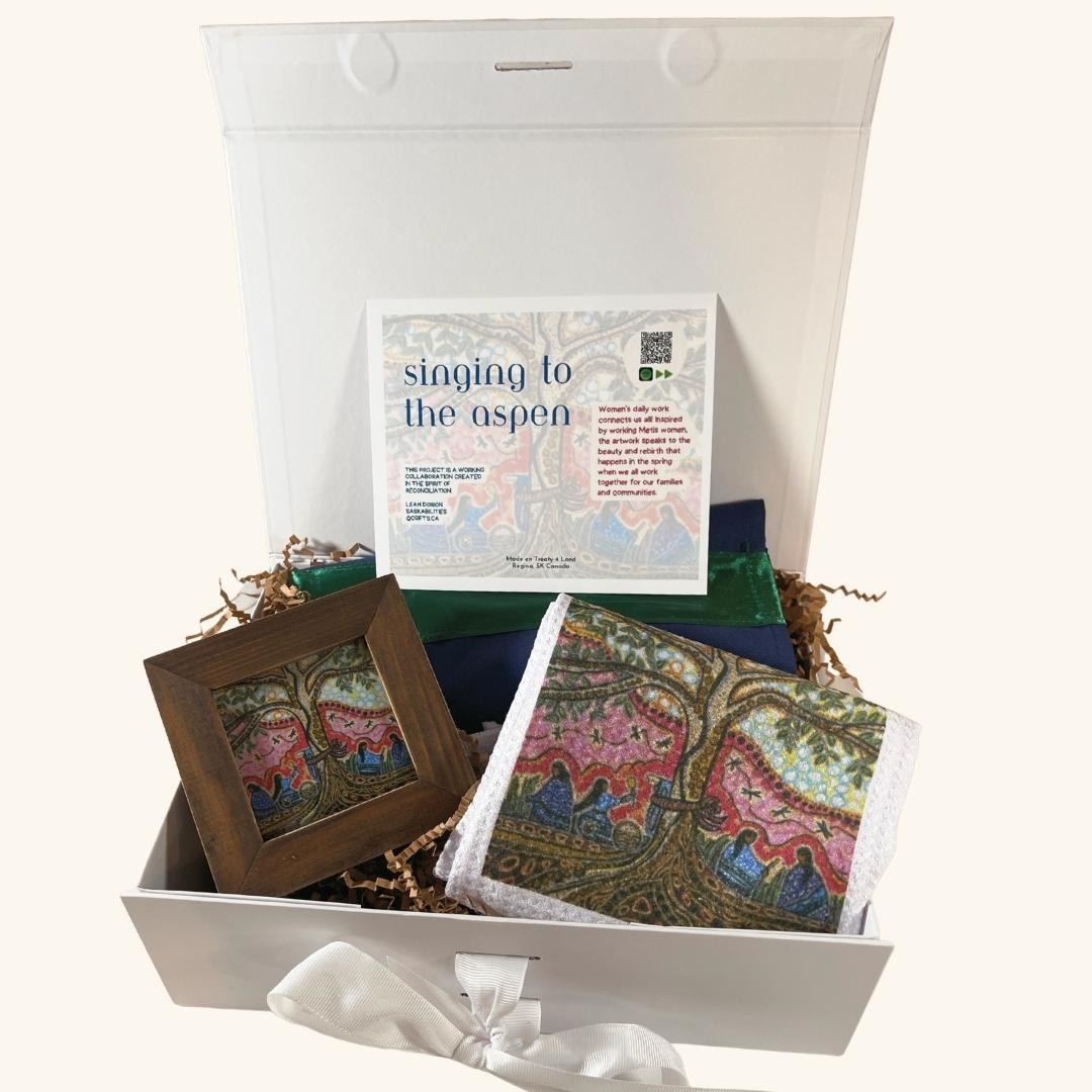 Contents of the Singing to the Aspen collection displayed outside the gift box, showcasing all included items