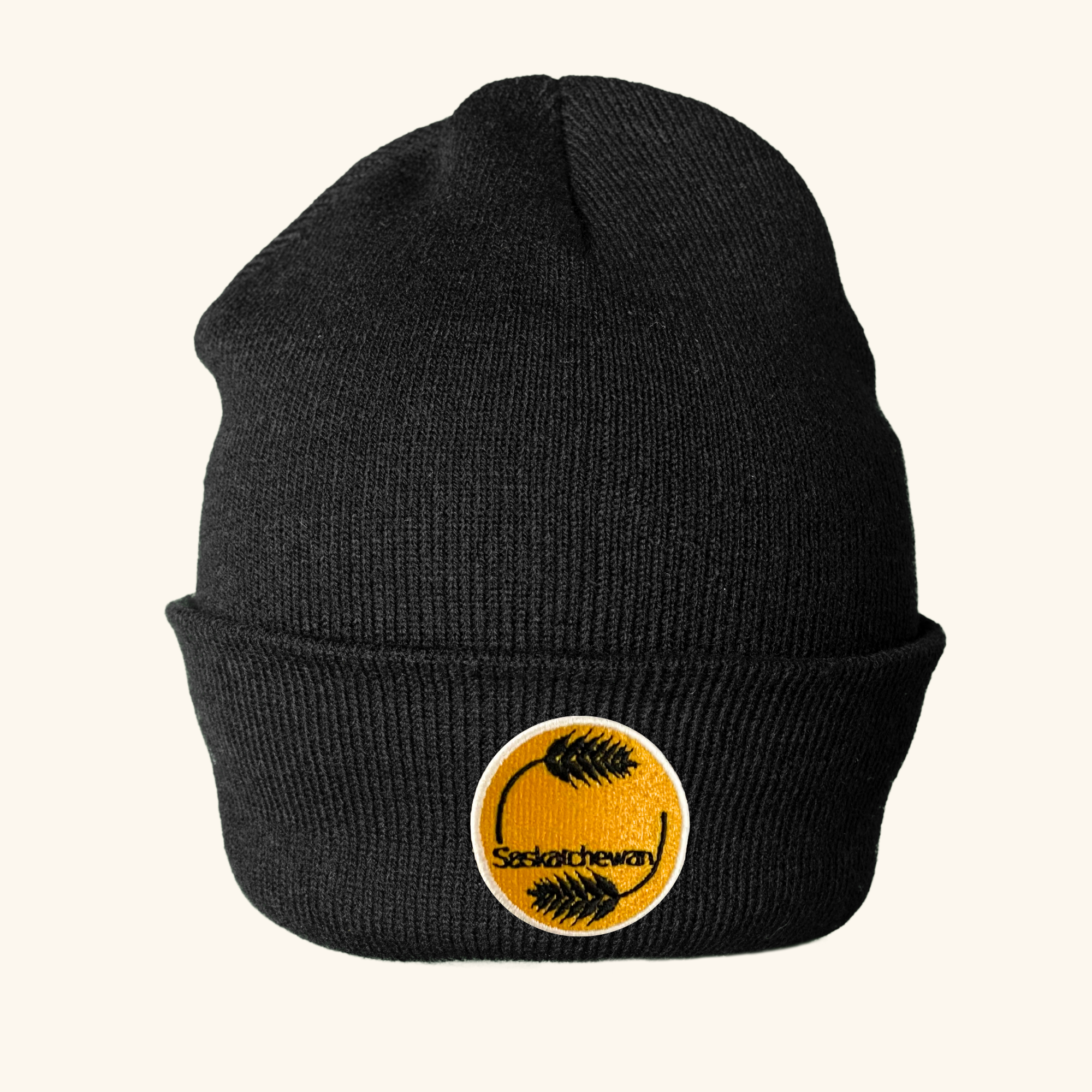 

For those brisk Saskatchewan winters, our cozy toque is also availabl